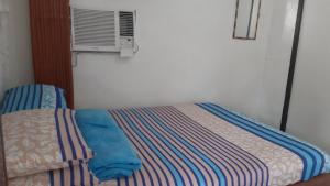 Postel nebo postele na pokoji v ubytování Beachaus Resort