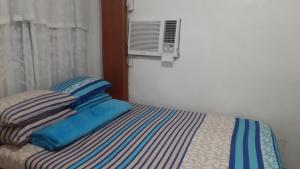 Postel nebo postele na pokoji v ubytování Beachaus Resort