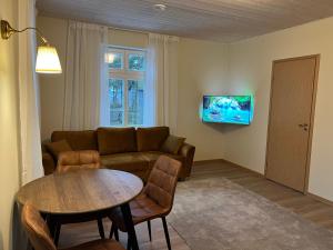 TV a/nebo společenská místnost v ubytování Vahe apartment