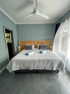 Southport Coral tesisinde bir odada yatak veya yataklar