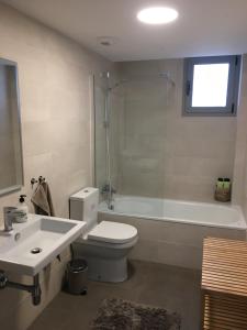 A bathroom at Duna Beach - Infinity Pool