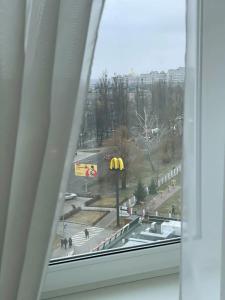 a view from a window of a mcdonalds restaurant at Подобово ЖК Центральний вул.Нове Шосе, 8А in Bucha