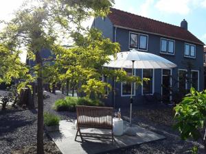 Zahrada ubytování Maan B&B + Galerie