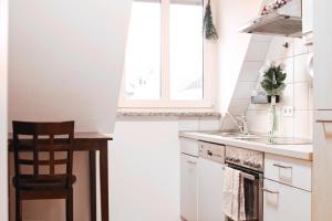 Kuchyň nebo kuchyňský kout v ubytování American Ease Apartments - Hahnbach, Vilseck, Weiden