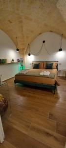 Postel nebo postele na pokoji v ubytování MATTEI LUXURY B&B