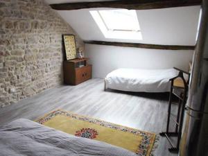Кровать или кровати в номере L'épicerie