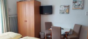 TV a/nebo společenská místnost v ubytování Pension Wildental