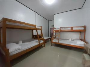 Postel nebo postele na pokoji v ubytování TheSoftbed Homestay