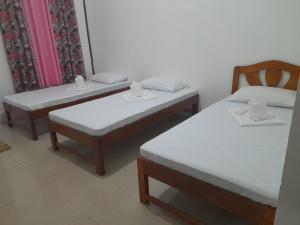 Postel nebo postele na pokoji v ubytování TheSoftbed Homestay