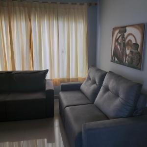 Ruang duduk di Apartamento para alugar - temporada
