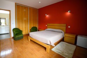 Postel nebo postele na pokoji v ubytování Funileiro, apartamentos e quartos + 37 fotografií