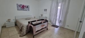 Posteľ alebo postele v izbe v ubytovaní Appartamento Centro Niscemi
