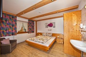 Ένα ή περισσότερα κρεβάτια σε δωμάτιο στο Ferienwohnungen Ehammer