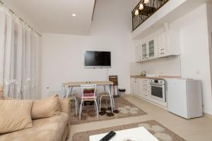 Kuchyň nebo kuchyňský kout v ubytování Apartman Sunce Zova