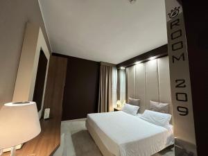Postel nebo postele na pokoji v ubytování Hotel Lafayette