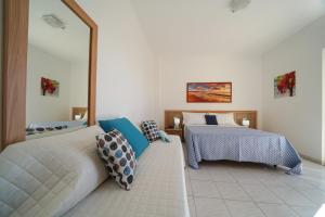 Ένα ή περισσότερα κρεβάτια σε δωμάτιο στο Hotel Damanse