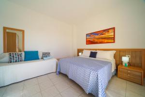 Ένα ή περισσότερα κρεβάτια σε δωμάτιο στο Hotel Damanse