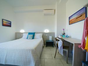 Ένα ή περισσότερα κρεβάτια σε δωμάτιο στο Hotel Damanse