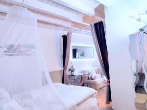 A bed or beds in a room at Casa Sabina