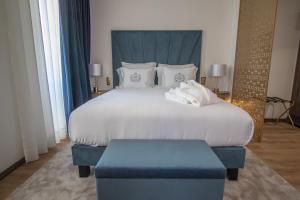 Cama ou camas em um quarto em Hotel República Boutique Hotel