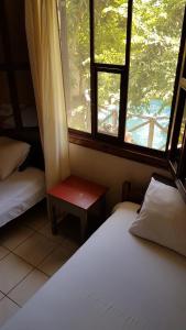 Postel nebo postele na pokoji v ubytování Casa del mare