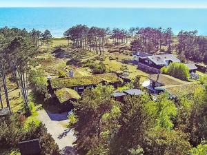 an aerial view of a house on a hill near the ocean at Holiday home Nykøbing Sj II in Tjørneholm