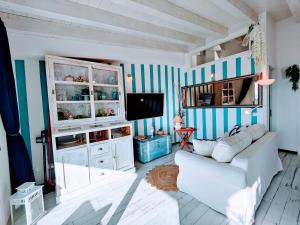 A television and/or entertainment centre at Casa Sabina