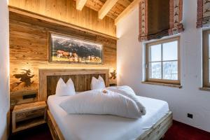 Ένα ή περισσότερα κρεβάτια σε δωμάτιο στο Hotel Restaurant Hexenalm