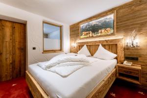 Ένα ή περισσότερα κρεβάτια σε δωμάτιο στο Hotel Restaurant Hexenalm