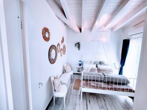 A bed or beds in a room at Casa Sabina