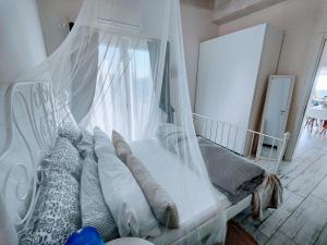 A bed or beds in a room at Casa Sabina