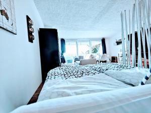 A bed or beds in a room at Casa Sabina