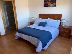 Posteľ alebo postele v izbe v ubytovaní CASA FAMILIAR COMPLETA EN PATOS NIGRAN