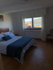 Posteľ alebo postele v izbe v ubytovaní CASA FAMILIAR COMPLETA EN PATOS NIGRAN