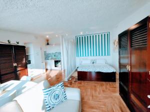 A bed or beds in a room at Casa Sabina