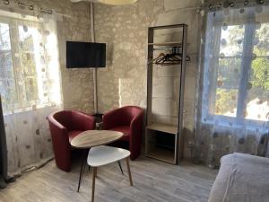 Część wypoczynkowa w obiekcie Gîte 3* Piscine Spa entre ZOO BEAUVAL FUTUROSCOPE CHATEAUX LOIRE