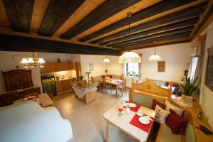 an aerial view of a living room and dining room at Gästepension Edeltraud in Hirschegg Rein