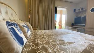 Ένα ή περισσότερα κρεβάτια σε δωμάτιο στο Apartamento térreo confortável no Condomínio Villa das Águas +51 φωτογραφίες