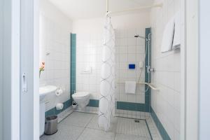 Vannituba majutusasutuses Business & Art Hotel Markgraf