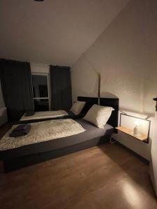 Ένα ή περισσότερα κρεβάτια σε δωμάτιο στο Górska 72 Dom pod Stokiem