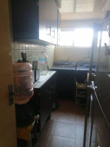 Η κουζίνα ή μικρή κουζίνα στο Departamento en Buenavista EXCELENTE UBICACIÓN