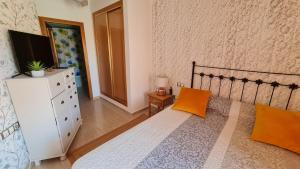 Posteľ alebo postele v izbe v ubytovaní Tirreno Vacances