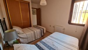Posteľ alebo postele v izbe v ubytovaní Tirreno Vacances