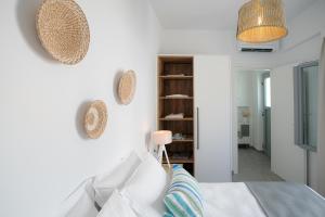 Letto o letti in una camera di Seanfinity Beachfront Suites