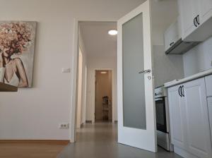 Kuchyňa alebo kuchynka v ubytovaní Izzy&Simple