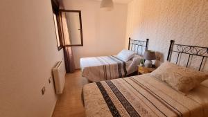 Posteľ alebo postele v izbe v ubytovaní Tirreno Vacances