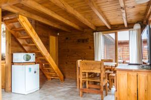 Kuchyň nebo kuchyňský kout v ubytování BOG Ocrehue - Cabanas