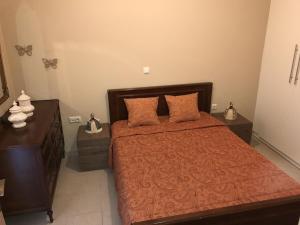 Posteľ alebo postele v izbe v ubytovaní Villa apartment with private garden near the beach
