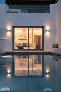Cucina o angolo cottura di Seanfinity Beachfront Suites