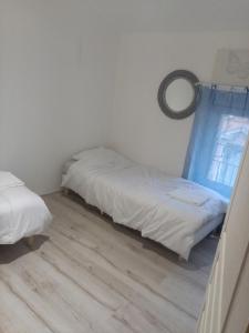 Posteľ alebo postele v izbe v ubytovaní Au p'tit bonheur
